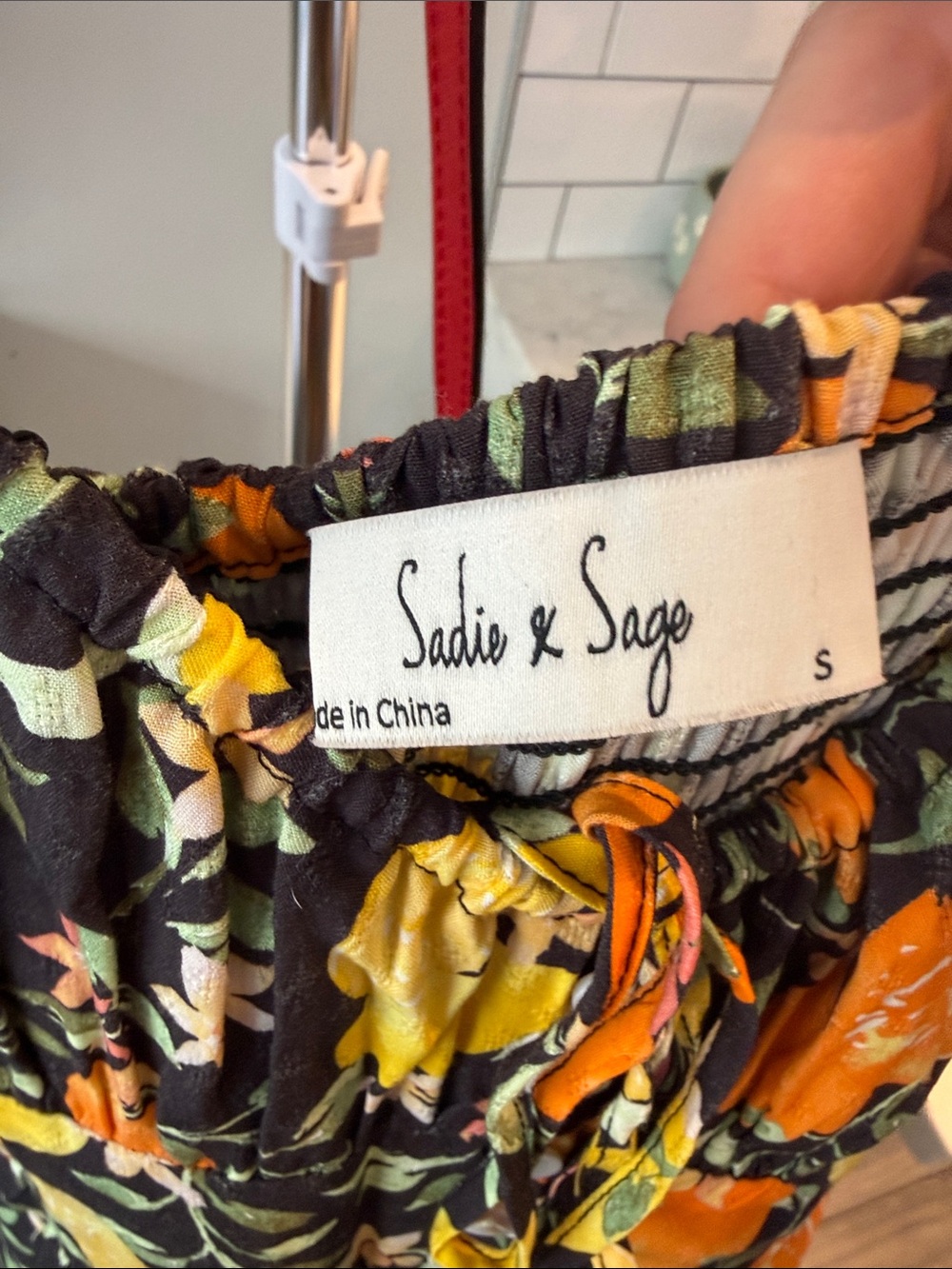 Sadie & Sage Black Jumpsuit with Orange & Yellow Floral Print - Picture 2 of 8